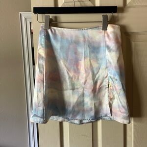 super cute multi color silk skirt! has a small slit on the side, size small